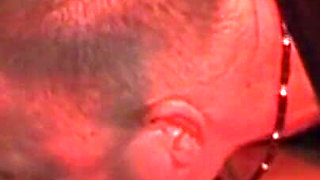 Mature Redhead Squirts Wildly in Intense Group Domination Session