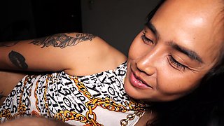 Guy feeding a hot Thai teens hairy pussy