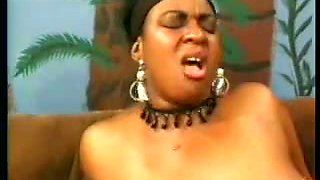 Busty Ebony MILF having fun with a younger black guy