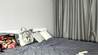 Amateur young brunette enjoys dildo on solo masturbation