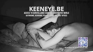 A couple is seen during a private moment on the bed