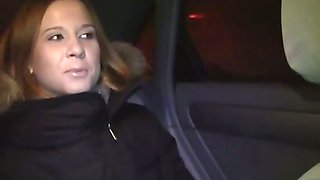 Sexy redhead fucked in a car