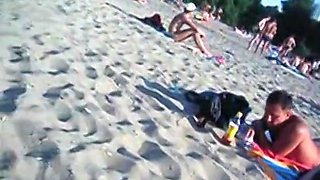 This beach has so many girls with naked boobs and asses