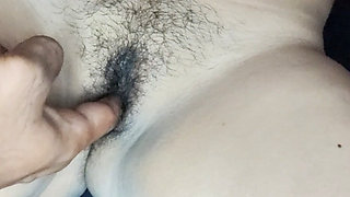 Fingers inserted into pink tight