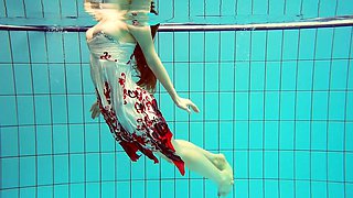 Hot Polish redhead swimming in the pool