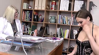 Mature female Doctor helps younger female