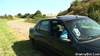 He picks up oldie from the road and fucks in the car