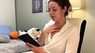 Voyeur of sexy brunette reading a hot romance novel and
