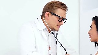 Stepdaughter in fishnets gives doctor a blowjob
