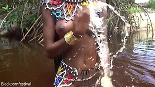 Zulu tribe chick with extraordinaire brilliant milk cans