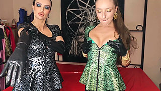 Double Handjob in Latex Gloves From Two Mistresses for a Slave