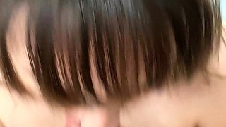 Big tit brunette sucks a big cock POV