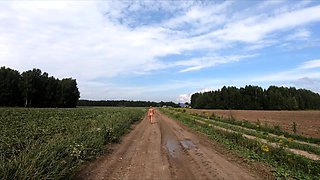 Naked Russian Babe Shows Off Her Big Ass in a Field