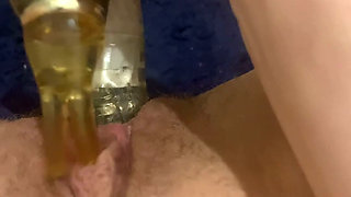 Wife masturbates on bathroom floor while husband hoovers outside