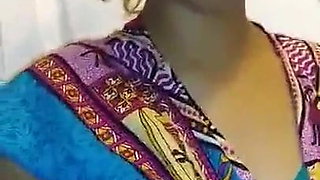 Hot Indian Wife squeezing milk into the glass