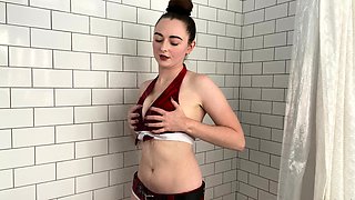 Busty babe playing with her big boobs