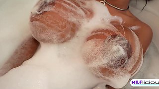 Ebony stepmom Tia lets him take a bath with her and pleases him in there