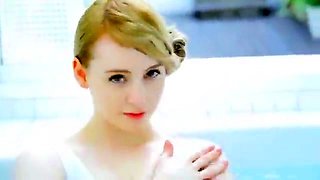 Mesmerizing blonde teen shows off the contours of her body