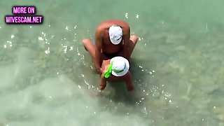 Mature couple sex in the sea