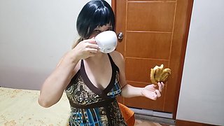 Sexy Girl Drinks Pee In A Cup While Eating A Cookie