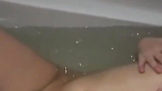 Young Amateur Girl with Huge Tits Masturbates Her Pussy with Big Dildo in the Tub