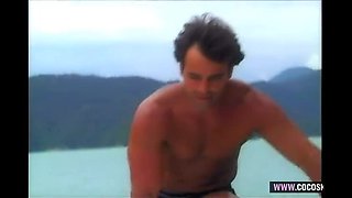 Muscular Guy Fucks Brunette in Floral Bikini on Yacht Deck