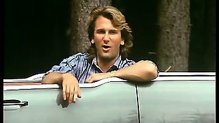 Retro girl gets fucked on top of a driving car