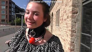 Tourist Wears Collar and Leash While Sightseeing