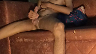 A young man masturbates to an erection