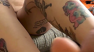 Tattooed Redhead Footjob Fun