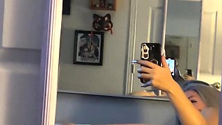 Masturbating busty blonde teen on couch with big toys