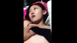 POV Shy Chinese Asian Gal tries to hide face during Orgasm