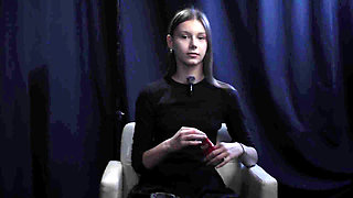 Young Girl Smoking Solo in a Calm Studio Session with Slow Exhales