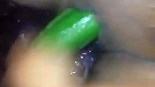 Ebony Riri fucks her veggies