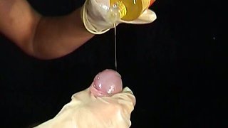 Nurse in latex gloves gives a handjob