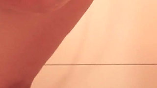 Shower Head Masturbation and a Dildo Deep Inside Her Pussy Gets Her to an Intense Orgasm