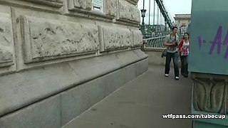 Young babe shows her tits in a public streets