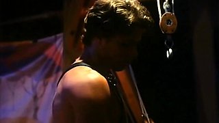 Sexy brunette enjoys a vintage bdsm fuck