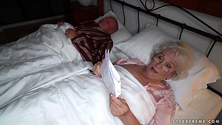 Granny Norma cheats on her sleeping husband with young stud