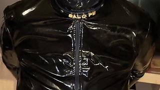 MILF in Bitbit Gag in Chained Latex Dress