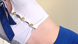A Sexy Flight Attendant Relaxes at a Hotel After Her Flight by Pleasuring Herself with a Large Dildo